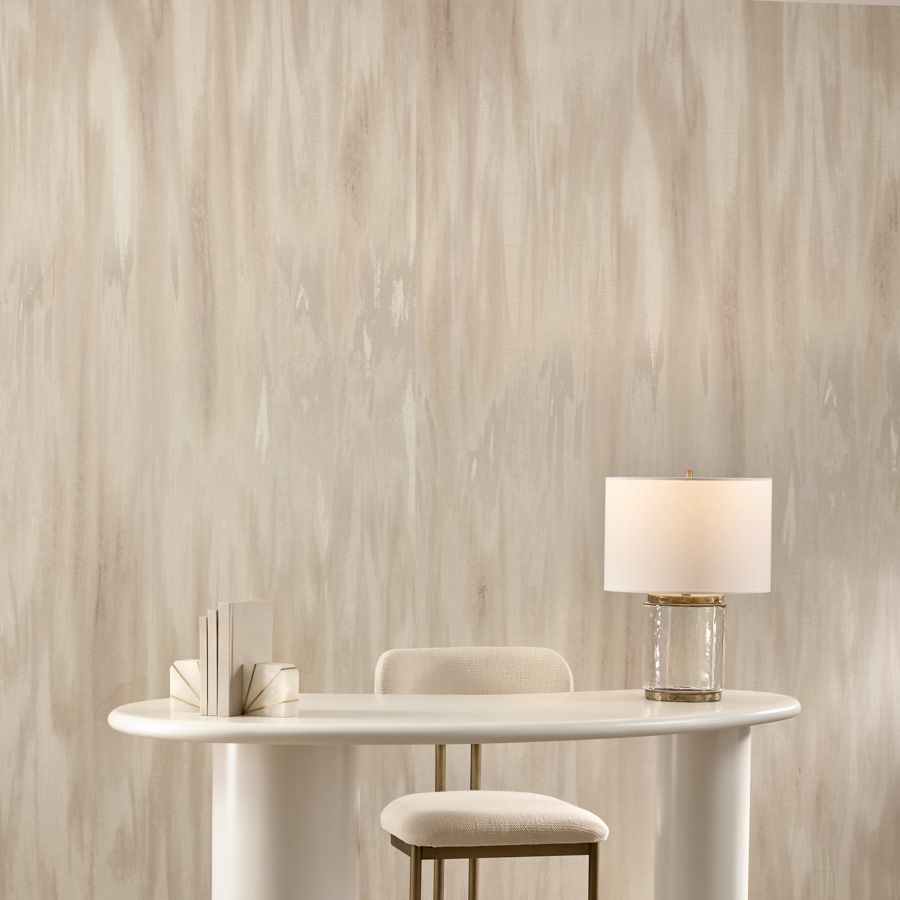A striking interpretation of a birch tree’s pattern, Mirage’s large-scale design features a cascading metallic gradient layered over a large-scale wood grain texture, digitally printed on a metallized textile in hues of silver, gold, or bronze. The combination produces a captivating ombré effect, enhanced by the shimmering fibers and iridescent hues that add opulence to any space.