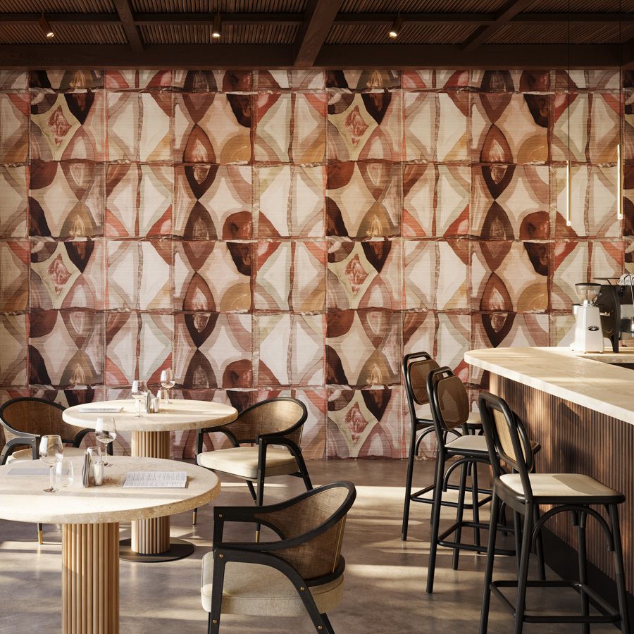 Initially painted by hand, Terra’s bold geometric pattern was digitized and printed on a metallic sisal in this 3-panel mural.  The intricate design was inspired by mud painting techniques, capturing stunning organic forms in a variety of earth tones, from the sierras to the sea, sure to enliven any space. The vibrant, saturated colors are tempered by the light texture of the metallic sisal to create an engaging display of organic tones.