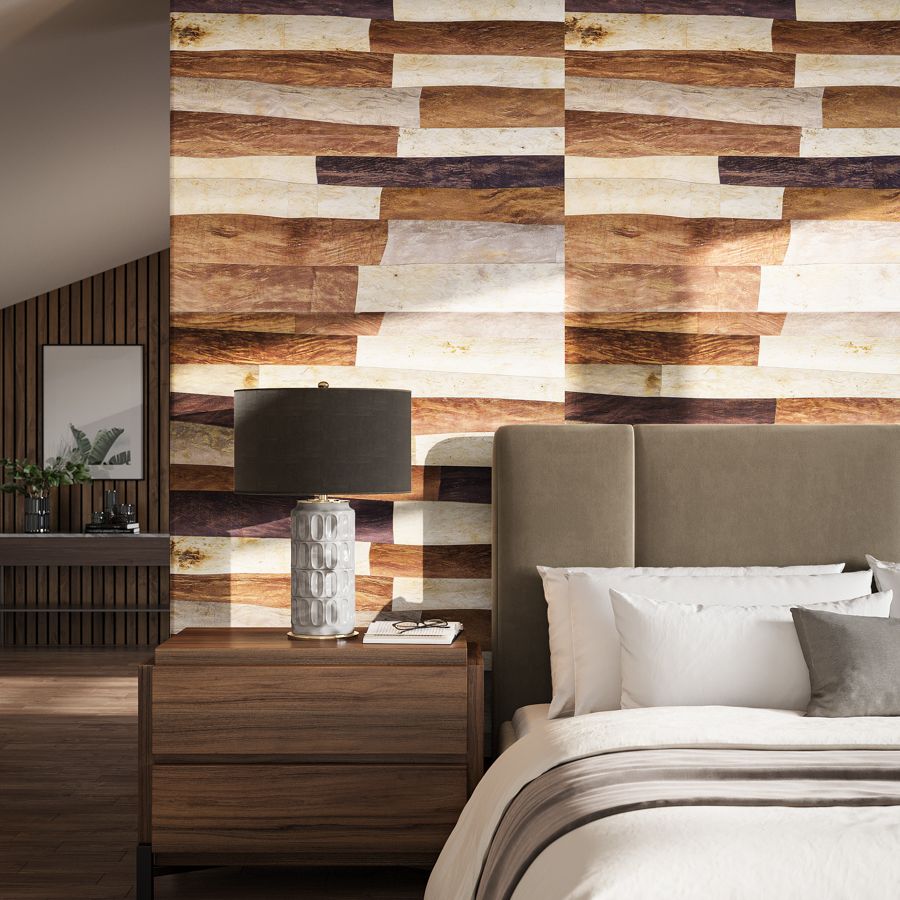 Mulberry exemplifies the fusion of timeless craftsmanship and the inherent beauty of natural fibers.  Crafted by hand through an ancient fabrication technique, natural tree bark is hand peeled, flattened and pressed into uniform sheets. Each sheet undergoes a double hand-dyeing process, with colors gracefully melding into the natural hues of the mulberry bark, creating a rich and dynamic finish.  The artisanal nature of this process guarantees subtle variations in both color and texture, rendering each piece truly unique.