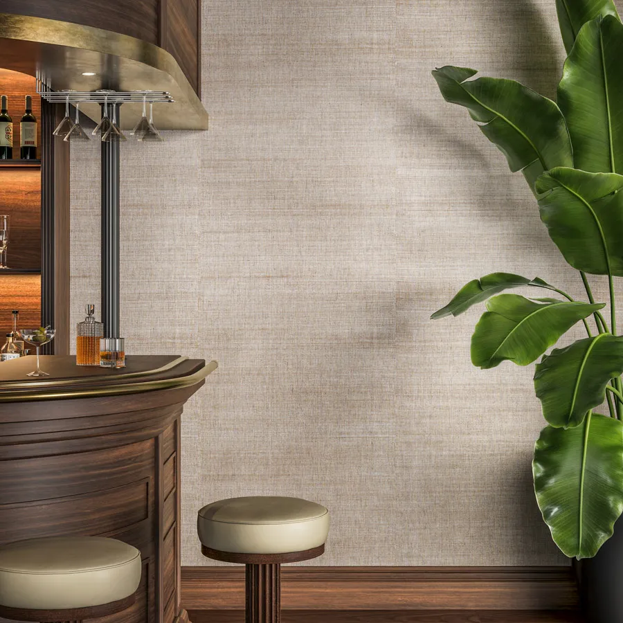 Corso is a natural woven wallcovering layered over a luminous metallic backing that draws intrigue from beneath its finely woven texture. Corso’s surface pairs a black warp with a richly colored grasscloth, forming a unique, organic pattern. When light moves across it, an understated radiance emerges, revealing a quiet interplay between the raw woven material and a refined sheen. Corso unites natural grasscloth with a luminous depth that brings life and dimension to any wall.