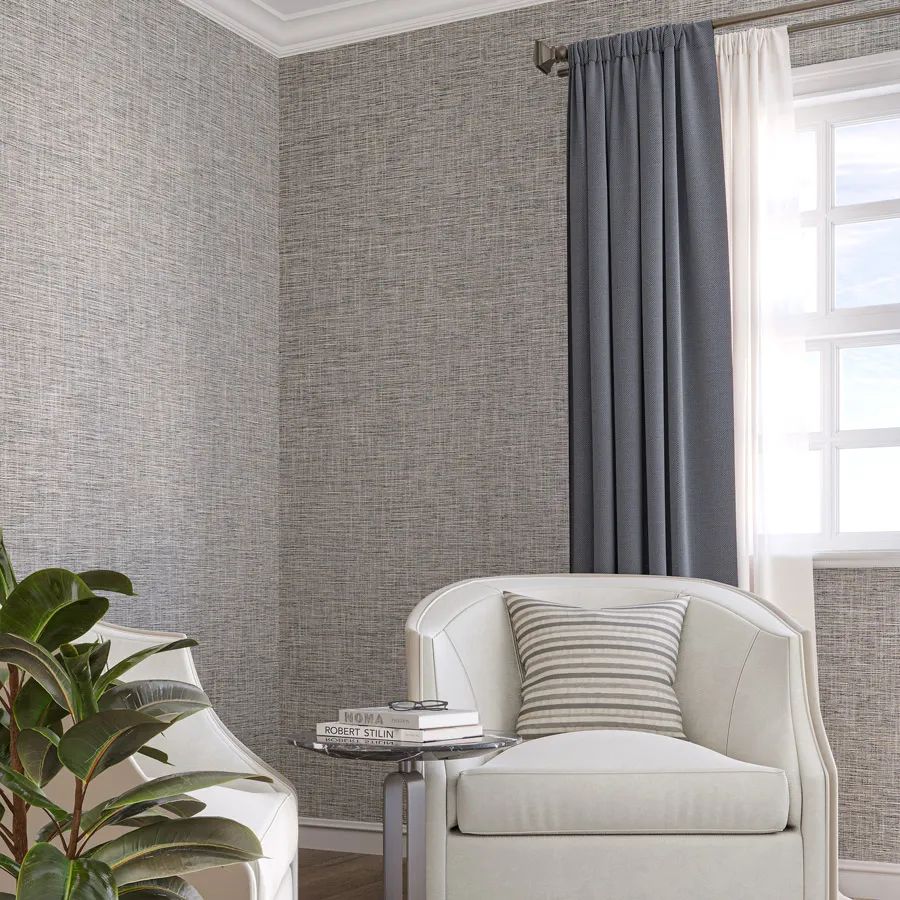 Veil is a linen wallcovering that transforms simple materials into an expression of movement and light. Unevenly twisted slub yarns run vertically through the weave, creating soft movement and a sense of airiness. Interlaced metallic threads reflect light and add depth, offering interiors a composition that is both striking in its simplicity and layered in its visual richness.