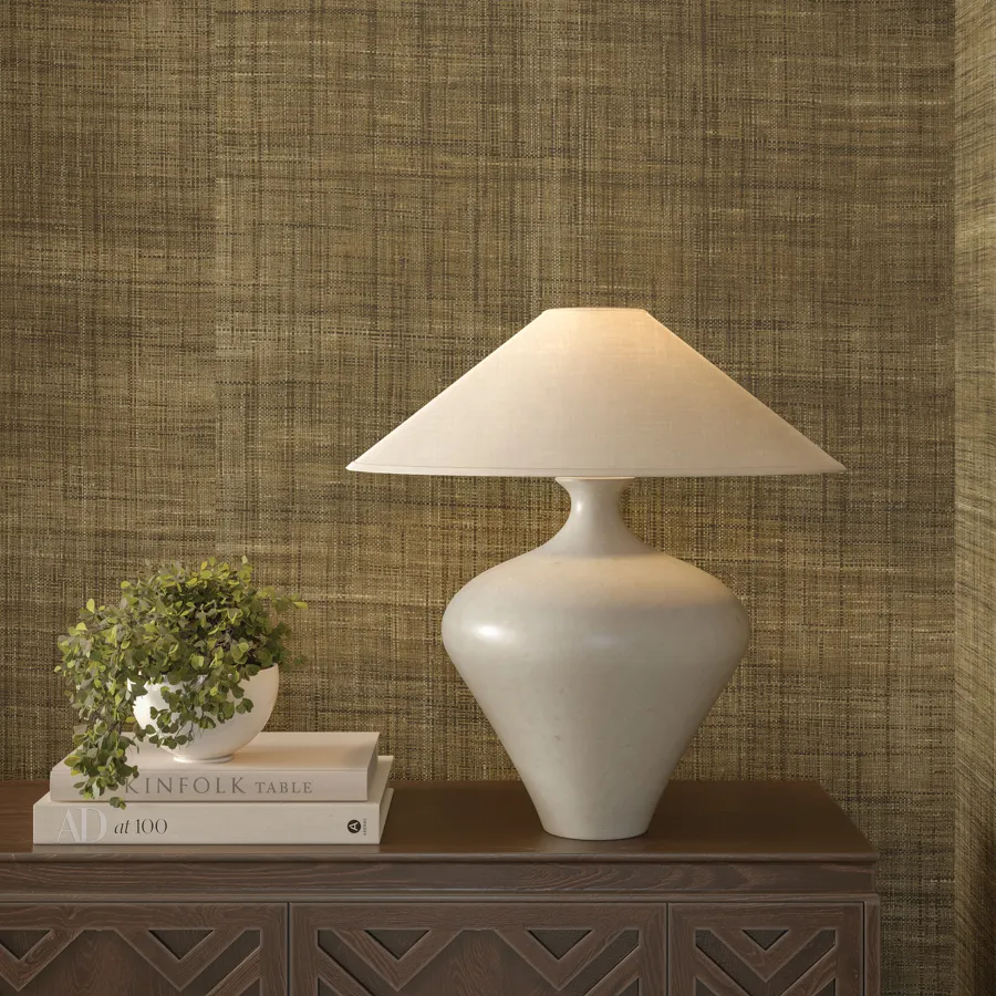 Balboa is a handwoven wallcovering crafted from natural raffia that highlights the artistry of traditional weaving. Space-dyed yarns create a soft, weathered effect with gentle shifts in tone and texture that feel organic yet refined. As the fibers interlace, a subtle plaid-like pattern emerges, adding depth and visual interest without overpowering the surface. This natural irregularity gives Balboa its distinctive character, an earthy and textural design that carries an understated elegance.
