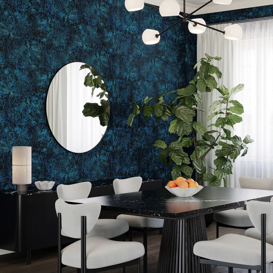 Flora’s textural layers and abstract floral pattern are a stunning interpretation of a garden at night, with rich tones and metallic highlights that shimmer as light moves across the surface. The layered composition suggests shifting depth, like foliage veiled in shadow and moonlight. This rich dimensional effect is created through a process of screen printing with raised ink, creating an elevated surface that enriches any space.